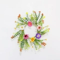 Detailed view of artificial daisy candle ring with colorful petals and green leaves - Summer Small Flower Candle Ring / Inner diameter approx 10cm