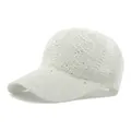 White cable knit baseball cap for women with subtle shimmering sequins and curved brim - White