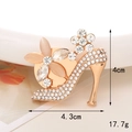 Cat eye stone high heel accessory with rhinestones shown with 4cm by 4.3cm dimensions - Gold Cat Eye High Heel + Disc