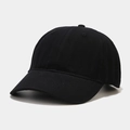 Detail view of cotton twill fabric and reinforced stitching on a black baseball cap - Adjustable / Black