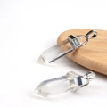 Double pointed transparent natural crystal hexagonal prism pendant with silver metallic loop - Clear White