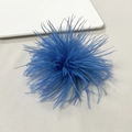 Detailed macro view of royal blue ostrich feather brooch with soft layered textures - Sapphire Blue