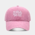 Detail of pink washed cotton baseball cap featuring white slogan embroidery and stitching - Adjustable / Pink