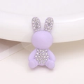 Detailed macro view of a purple resin rabbit charm with sparkling inlaid rhinestones - Purple Rabbit