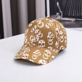 Stylish brown baseball cap featuring creative white skull pattern with red eyes - Adjustable / Yellow Skull