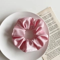 Pink satin scrunchie with pearly luster on white plate with vintage book prop - Satin Pink