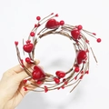 Detailed close-up of handmade red heart berry candle ring wreath with glossy finish - Inner Diameter 10cm / Red and White Heart Berry