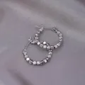Polished S925 sterling silver beaded hoop earrings with a shiny metallic finish - E-027---Platinum