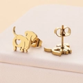 Golden dachshund stud earrings with heart cutout design and polished stainless steel finish - Gold