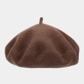 Close-up of thick dark brown wool beret showing refined felt texture and top stem detail - One Size / Coffee