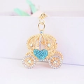Golden pumpkin carriage keychain with blue heart rhinestone and crystal wheels - Blue