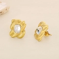 Macro shot of irregular gold base with clear square crystal inlay for elegant earring - Gold Wavy Square Zircon Style (KE116428-KFC)