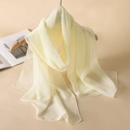 Elegant cream yellow chiffon long scarf hanging on a wooden hanger for styling - Cream Yellow
