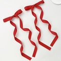 Close-up of two red ballet style ribbon bow hair clips with elegant silk streamers - Red (1 Pair)