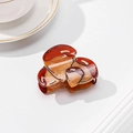 Unique mushroom-shaped hair claw clip in a glossy amber brown acetate finish - Mushroom / Amber/Brown