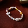 Close-up of beaded macaron cat eye bracelet with elephant charm on dark textured fabric - Multicolor Dog Style (2#)