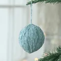 Blue 6cm wool felt yarn ball ornament hanging on Christmas tree branch - Haze Blue