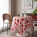 Pink velvet tablecloth with vibrant red floral and strawberry patterns on a round table - Pink Pomegranate Velvet