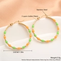 Orecchini a cerchio ondulati dorati con smalto arancione e verde in acciaio - Verde Giallo (EE03-1)