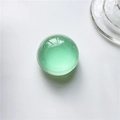 Expanding phone grip with a crystal clear emerald green dome for desk support - K9 Emerald Green Transparent Ball