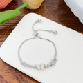 Silver adjustable butterfly bolo bracelet with shell inlay and pavé zircon stones - Silver Shell Butterfly