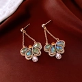 Detailed macro view of vintage butterfly drop earrings with multi-colored crystals - Gold Green Pink (Silver Needle)
