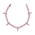 Detail of pink zircon stones set in golden tennis bracelet with diamond-encrusted spikes - 16cm / Rose Gold