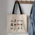 Detail of artistic canvas tote bag with 12 cute cat illustrations hanging on a wooden hook - Beige Multi Cats