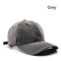 Grey washed denim baseball cap featuring a distinctive red W letter embroidery - Gray