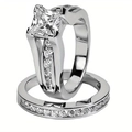 Detailed macro view of silver wedding ring set featuring princess cut diamond and pave band - US 7 / Women's Silver-Tone Princess Cut Set