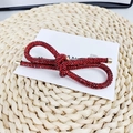 Fermaglio per capelli con fiocco di cristalli rossi su cartoncino bianco elegante - Stile Zirconia Rossa