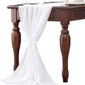 Elegant white chiffon table runner with delicate bow ties on a dark wooden dining table - Bleached White