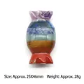 Handcrafted seven chakra crystal gemstone carving in a candy shape with tiered colors - Candy