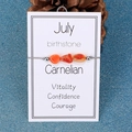 Detailed view of July birthstone bracelet with raw carnelian beads and silver accents - July/Carnelian