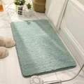 Thick light green plush bathroom mat with non-slip backing on marble floor - Summer Light Green