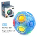 Blue Magic Rainbow Ball puzzle toy with colorful buttons in transparent casing - Blue English Boxed