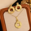 Golden irregular geometric ring jewelry set featuring a necklace and stud earrings - Gold Multi-Layer Circular Jewelry Set