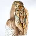 Golden paisley satin square scarf worn as a headscarf with silky shine finish - 90*90cm / Gold Yellow
