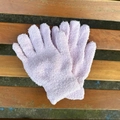 Detailed close-up of lavender fuzzy gloves on a wooden bench showing chenille texture - One Size / Light Pink