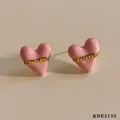 Chic pink enamel heart stud earrings with golden chain detail in 316 stainless steel - Pink