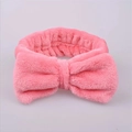 Plush bright pink bow headband made of soft coral fleece for face washing and makeup - Watermelon red