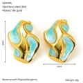 Detail of 18k gold plated stainless steel butterfly earrings with blue enamel finish - Light Blue Irregular Wave Style (SE830G)