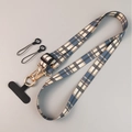 Adjustable crossbody phone lanyard with blue and white plaid fabric and gold metal clips - Blue and Grey Plaid
