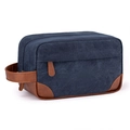 Angled view of a navy blue canvas toiletry bag with premium brown PU leather details - Navy Blue