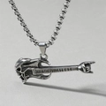 Silver skull and electric guitar necklace with rock-on metal gesture on a box chain - Rock Guitar Skull