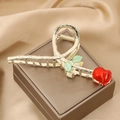Elegant gold metal hair claw clip featuring red rose flower and green leaves decoration - Gold Red Rose-TZA13-29