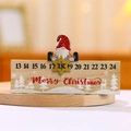 Wooden Christmas countdown calendar ornament featuring a gnome and star on base - Sitting Santa Style
