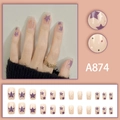 Faux ongles rose translucide avec motifs d'étoiles mauves et détail de bague chic - Style Rose Étoile Violette (A874)