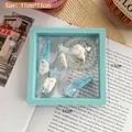 Blaues Haaraccessoires-Set mit Sternen und Wolken in 11cm blauem Schweberahmen - Blaue Wolke 5-teiliges Haargummi-Set (Folienbox)