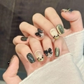 Star Butterfly black and gold cat-eye press-on nails with 3D bows and pearls - Large L (31-Ultra Short Trapezoid)